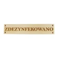 tabliczka z napisem Zdezynfekowano