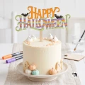 Topper napis "Halloween" z nietoperzami w paski